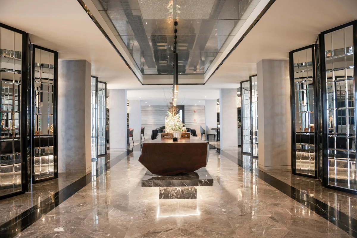 Featuring a dominant use of wood and marble, the design immerses guests in a natural and indigenous cultural experience.