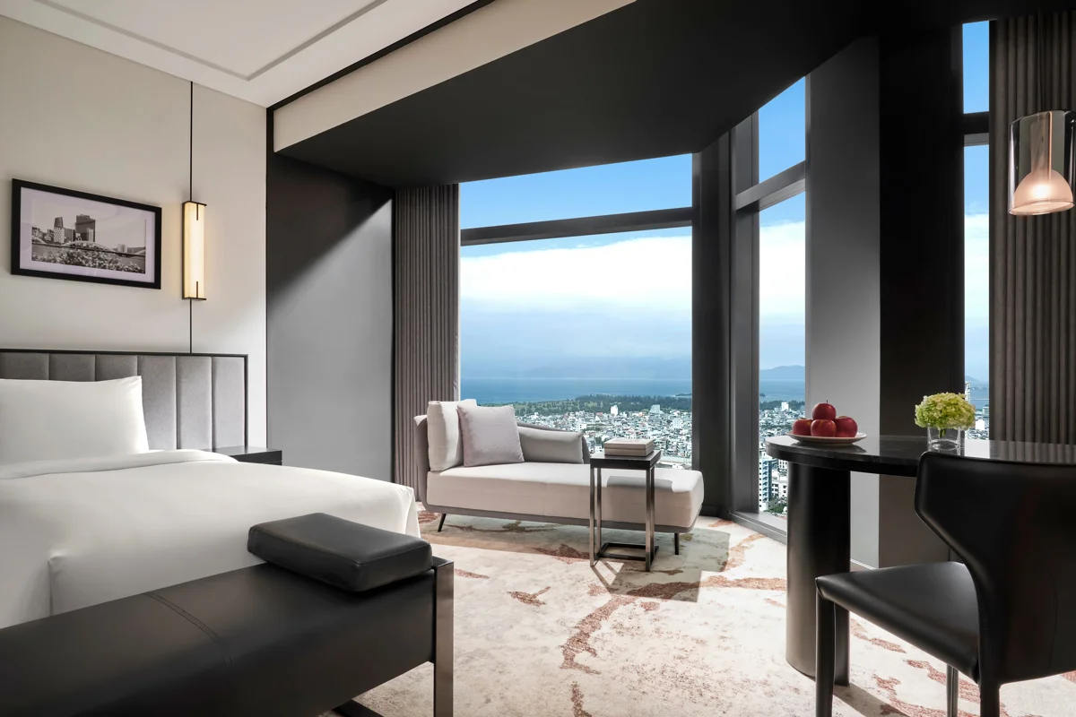 Incorporating asymmetrical interior accents of stainless steel and glass, the design infuses the hotel with dynamic energy and modern vitality.